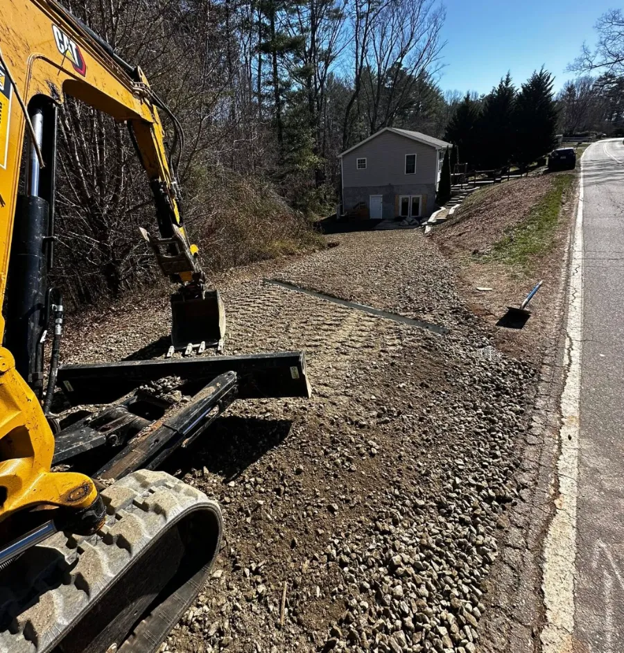 Drive with a new ditch line cut beside it
