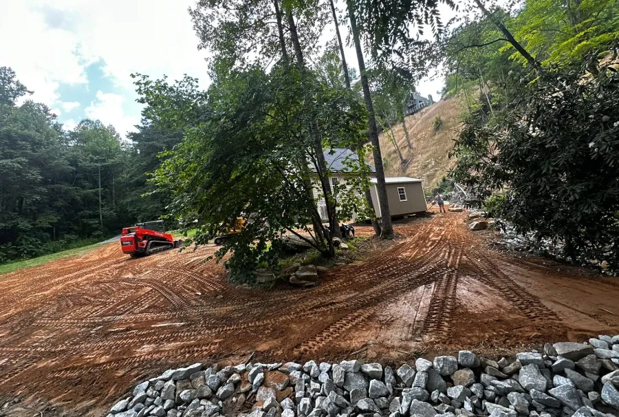 Graded slope finished with stone