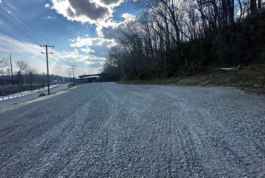 Long gravel road freshly spread