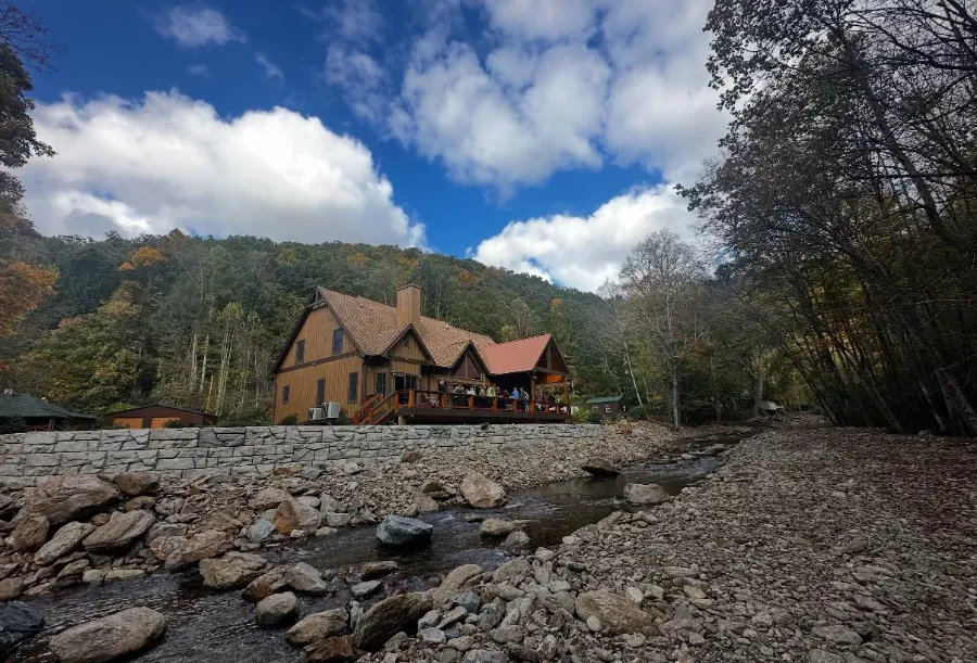 Home above a rebuilt river bank