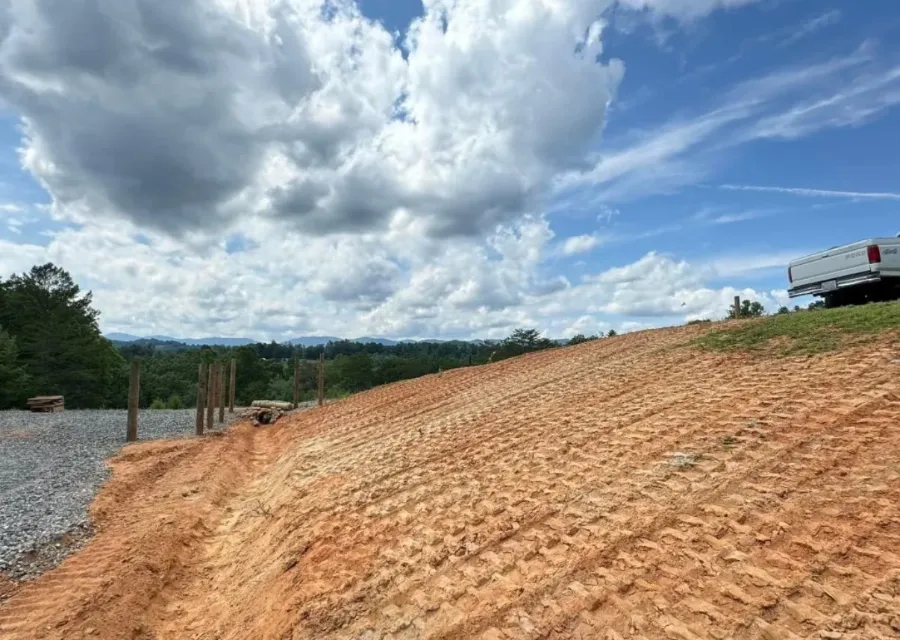 Graded slope protected with silt fence